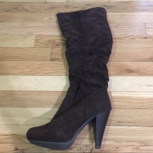 Knee high heeled boot
